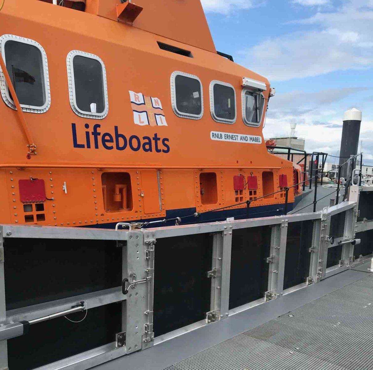 RNLI Weymouth picture of life boat and new fender wall featuring Bloxwich Door Gear BS2010N