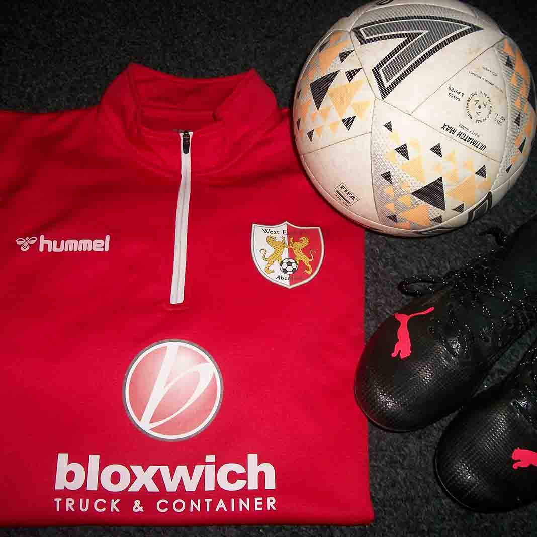 Image showing new Hummel training tops of West End Red under 18's football team provided by Bloxwich Truck and Container