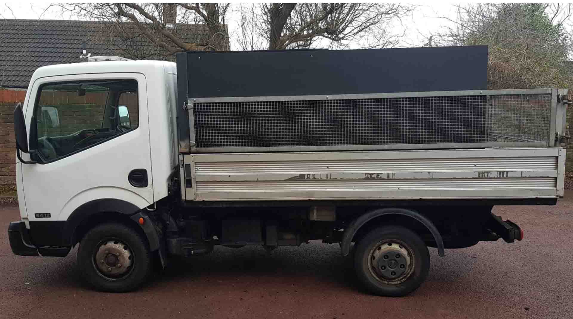 2012 Nissan Cabstar 34.12 dropside, side view