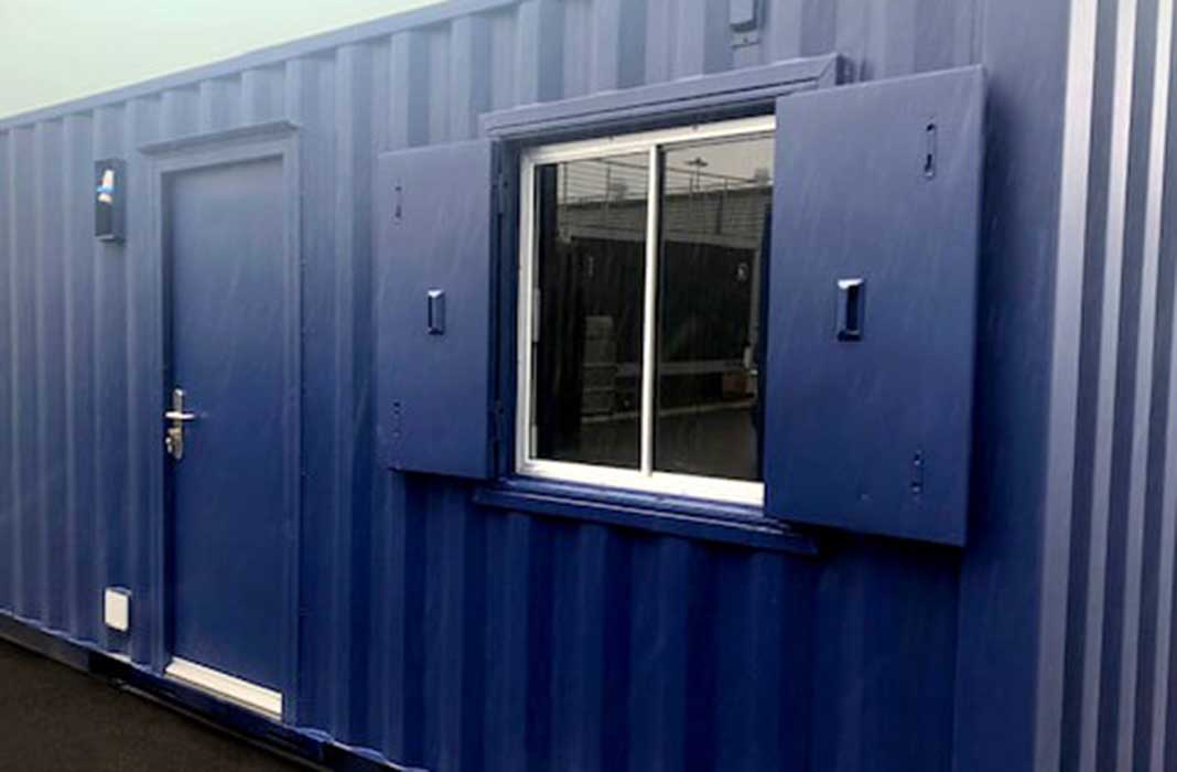 Latham’s Steel Security Doorsets personnel door, window and shutter fitted to a container.