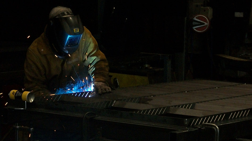 welder at Bloxwich truck and container making products