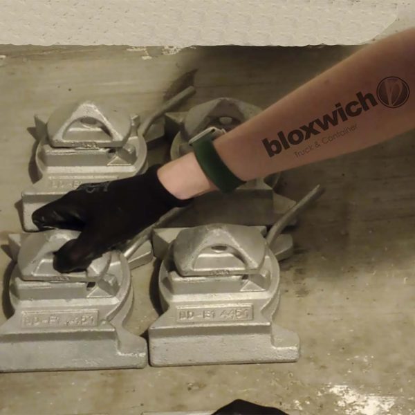 Member of the Bloxwich team with a Bloxwich tattoo handling some parts as part of a customer order.